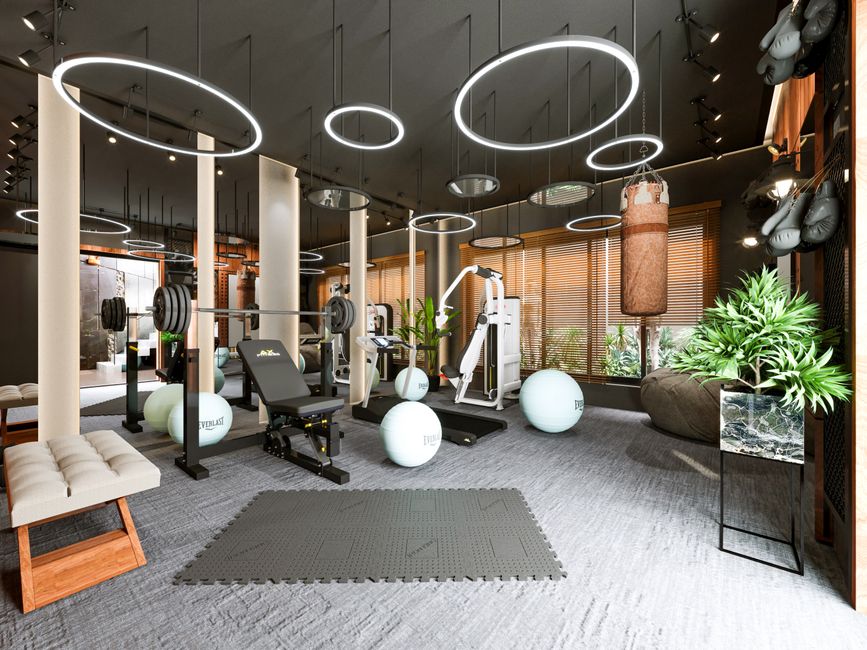 Stylish gym interior showcasing fitness equipment and contemporary lighting design.
